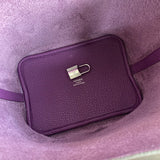 Side view of sophisticated structured handbag