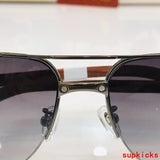 Close-up detail view of Cartier unisex sunglasses