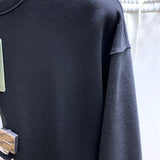 Close-up of Balenciaga designer clothing craftsmanship