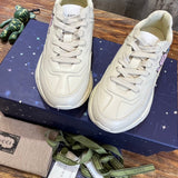 Gucci two-tone luxury sneakers view 10 signature lace-up style