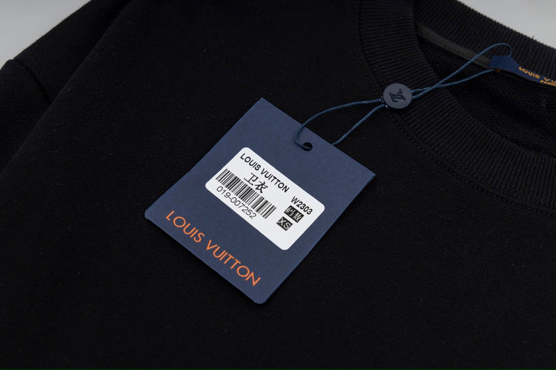 Full styled look of Louis Vuitton luxury clothing with relaxed-fit cut