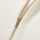 Back view of Gucci luxury clothing with logo-detail design