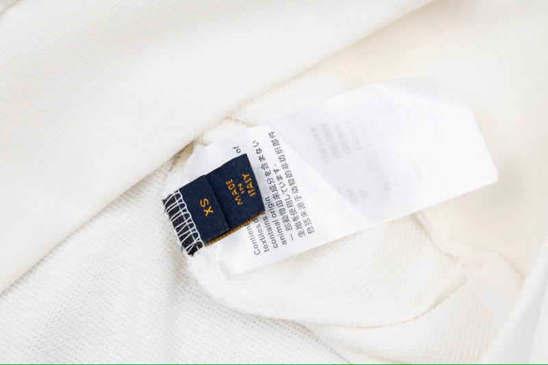Close-up detail shot of Louis Vuitton luxury clothing with streetwear-inspired cut