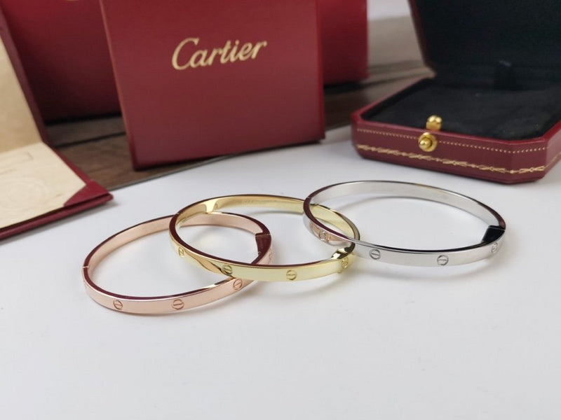 Side view of Cartier unisex jewelry piece