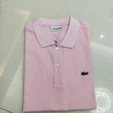 Side profile of Lacoste luxury clothing with signature branding
