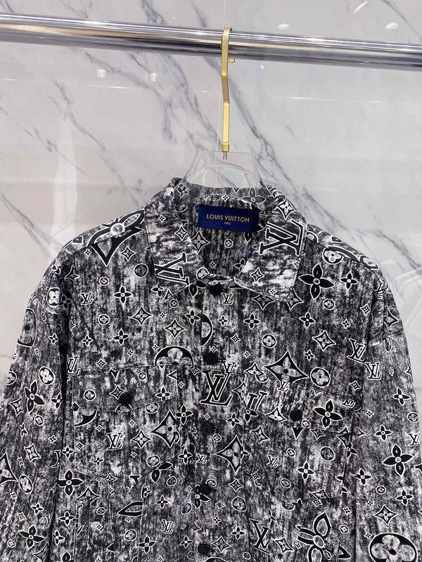 Close-up detail shot of Louis Vuitton luxury clothing with label-forward styling