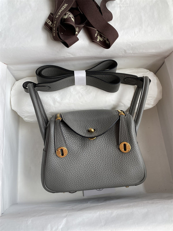 Side view of polished structured handbag