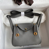 Side view of polished structured handbag