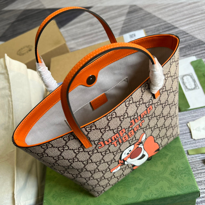 Handle and strap detail of statement polished women's handbag – women's luxury handbag