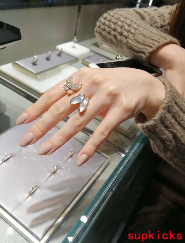 Lifestyle view of Van Cleef & Arpels unisex jewelry piece