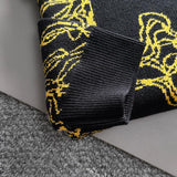 Side profile of Louis Vuitton luxury clothing with label-forward styling