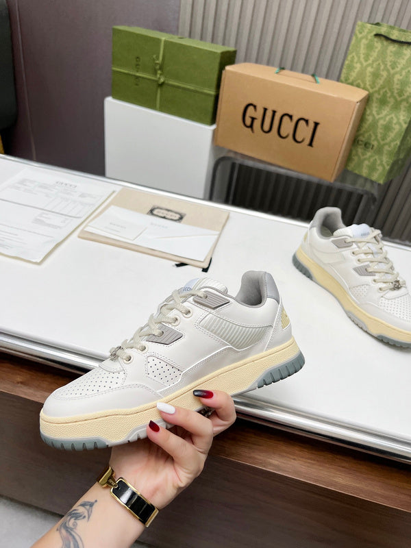 Gucci crisp white luxury sneakers view 10 retro runner design