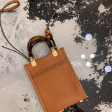 Ziva's Charm handbag – front view (13cm*6.5cm*18cm)