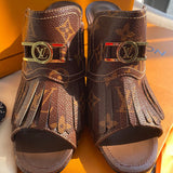 Close-up detail view of Louis Vuitton luxury piece style No.010