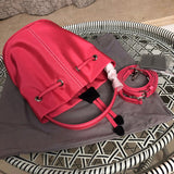 Back view of sleek statement women's handbag – women's statement bag