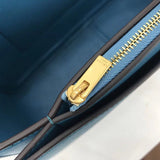 Front view of chic structured women's handbag – women's designer-style accessory