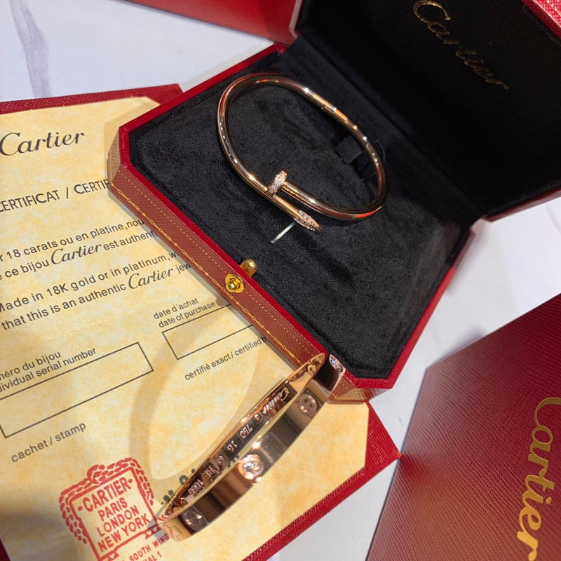Close-up detail view of Cartier unisex jewelry piece