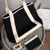 Handle and strap detail of chic everyday-luxe women's handbag – women's everyday handbag