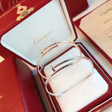 Angled view of Cartier unisex jewelry piece