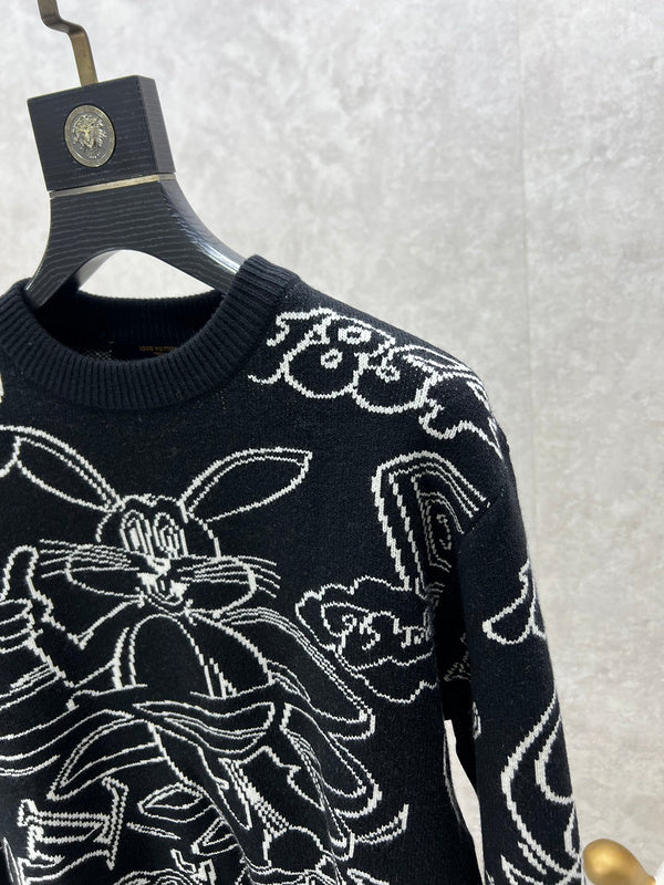 Full styled look of Louis Vuitton luxury clothing with label-forward styling