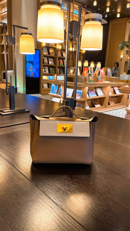  Polished crossbody bag carried on shoulder