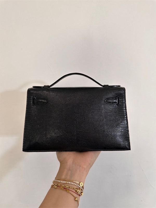  clean-lined crossbody bag detail view showing craftsmanship