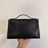  clean-lined crossbody bag detail view showing craftsmanship