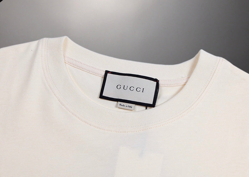 Full styled look of Gucci luxury clothing with signature branding