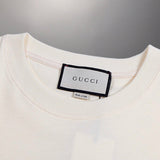 Full styled look of Gucci luxury clothing with signature branding