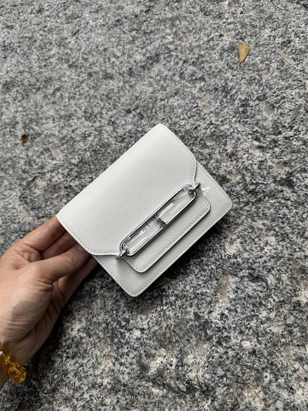 Side view of clean-lined structured handbag