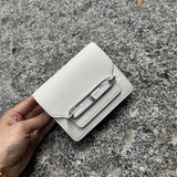 Side view of clean-lined structured handbag