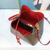 Top view of elevated classic women's handbag – women's statement bag