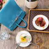  Signature tote bag carried on shoulder 10