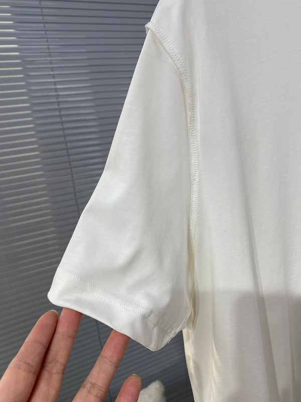 Flat lay presentation of Louis Vuitton cotton t-shirt with streetwear-inspired cut