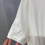 Flat lay presentation of Louis Vuitton cotton t-shirt with streetwear-inspired cut