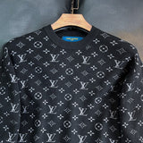 Full styled look of Louis Vuitton luxury clothing with monogram-inspired silhouette