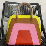 Close-up detail of statement bag design