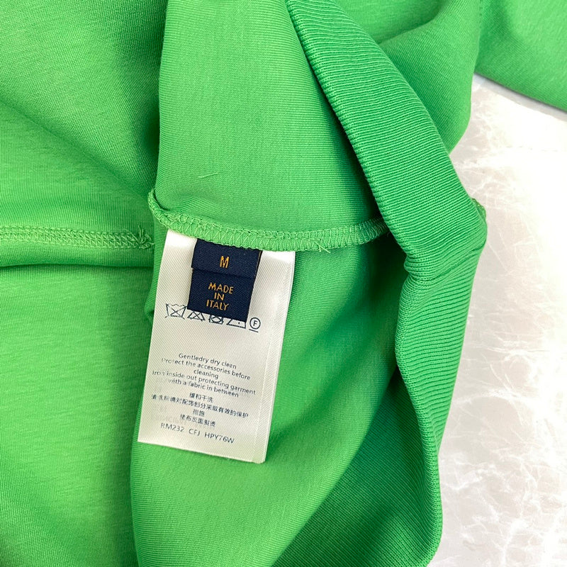 Side profile of Louis Vuitton luxury clothing with tailored silhouette
