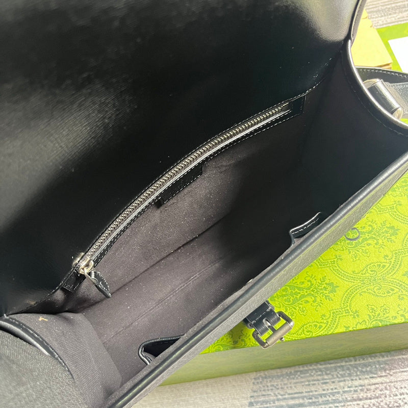 Close-up detail of signature statement women's handbag – women's everyday handbag