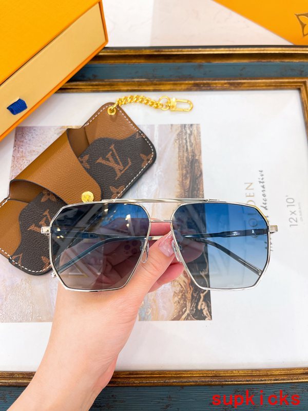 Close-up detail view of Louis Vuitton unisex sunglasses