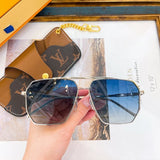 Close-up detail view of Louis Vuitton unisex sunglasses