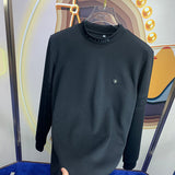 Front view of Louis Vuitton luxury clothing with monogram-inspired silhouette