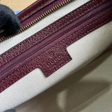 Side profile of polished chic women's handbag – women's luxury accessory