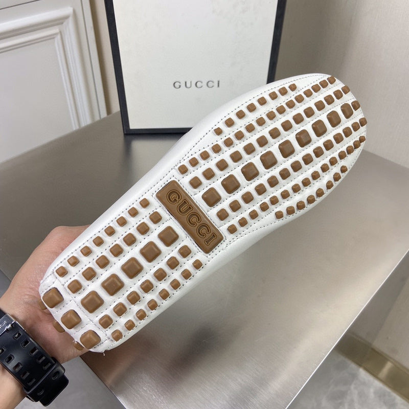 Side profile of Gucci crisp white sneakers cushioned comfort fit