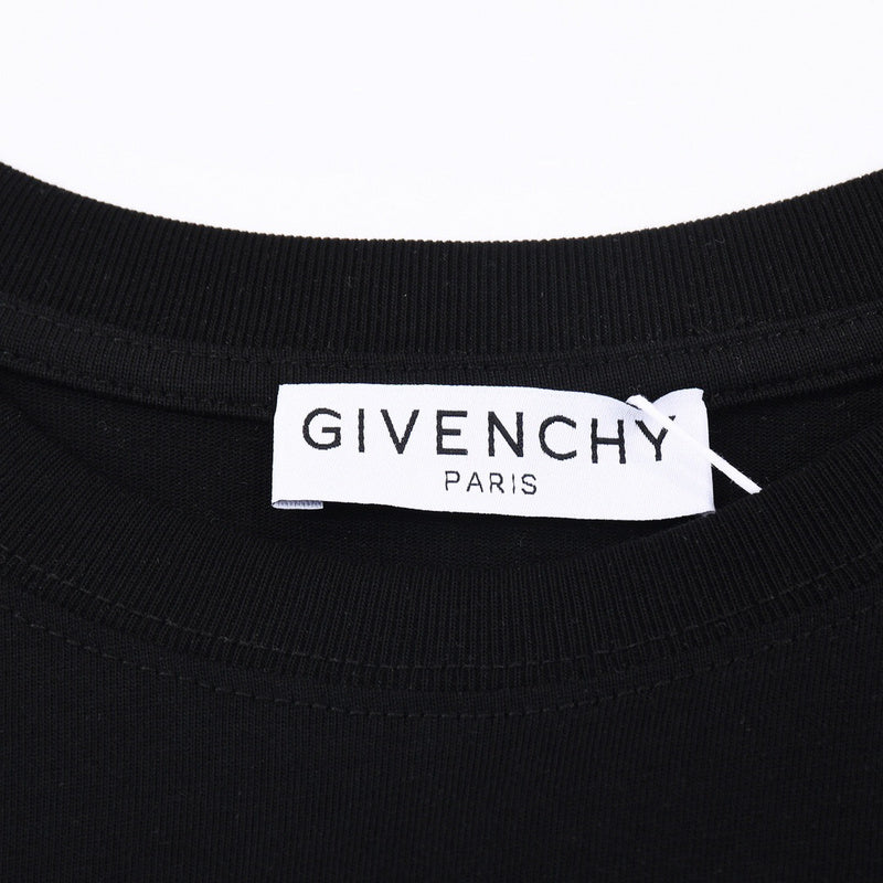 Close-up detail shot of Givenchy luxury clothing with monogram-inspired silhouette