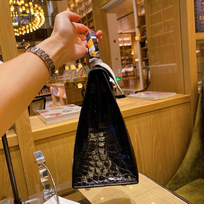 Side view of versatile structured handbag