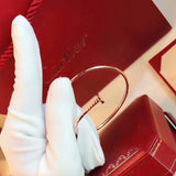 Close-up detail view of Cartier unisex jewelry piece