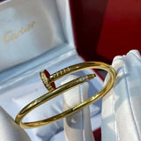 Close-up detail view of Cartier unisex jewelry piece