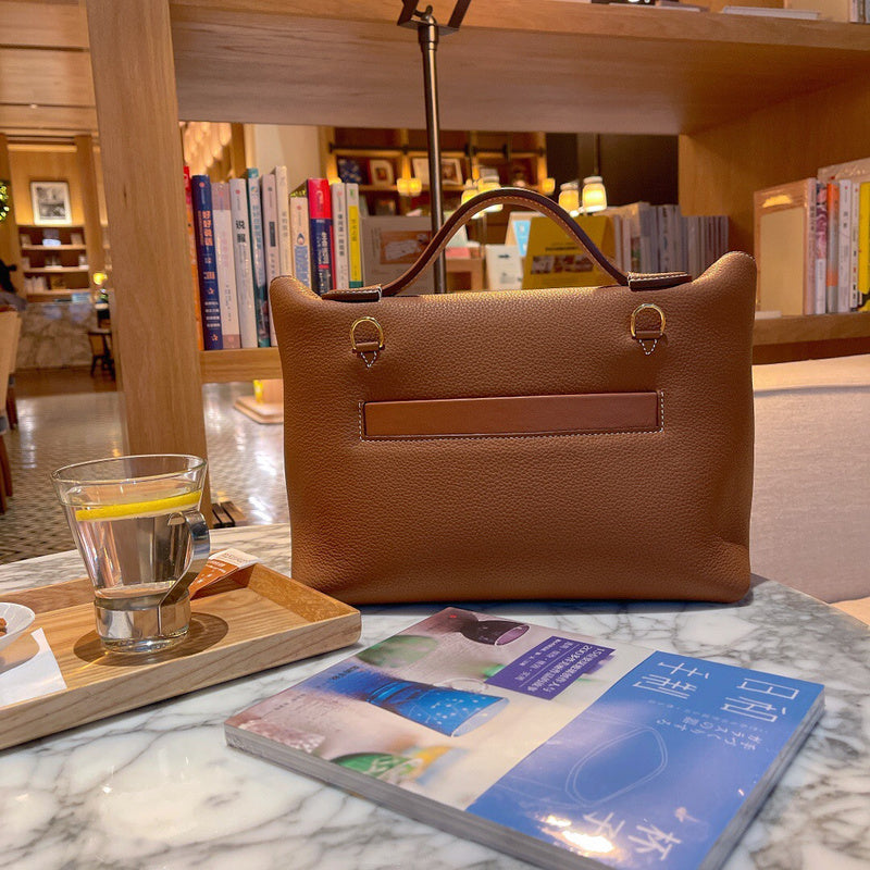 Side view of timeless structured handbag