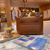 Side view of timeless structured handbag